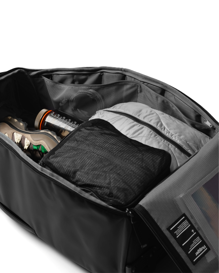 Hugger Roller Bag Check-in 60L Black Out