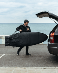 SurfBagSingleBoardMid-length-onperson_6e74f81b-14df-4f7d-a112-edafc10eead4.png